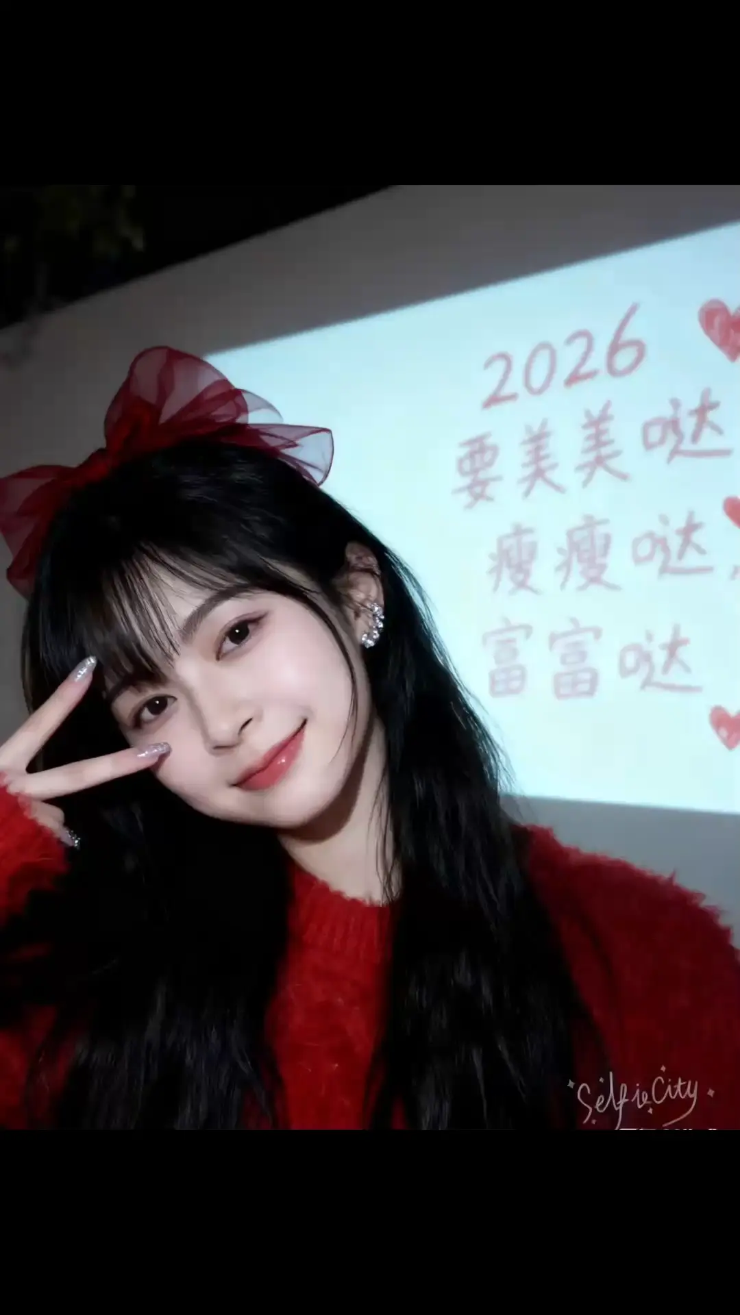 来！笑一个，拍照咯/